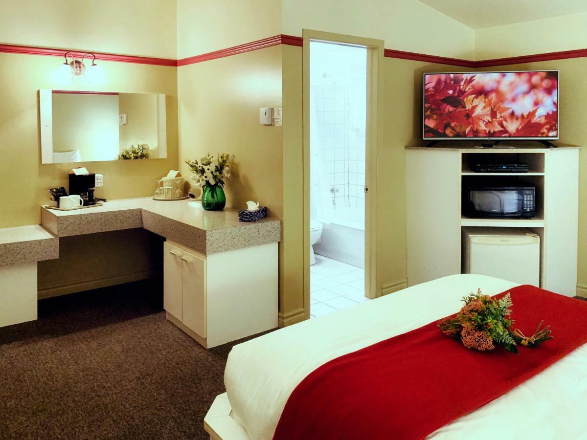 Motel La Cheminee Saint-Jerome Bagian luar foto